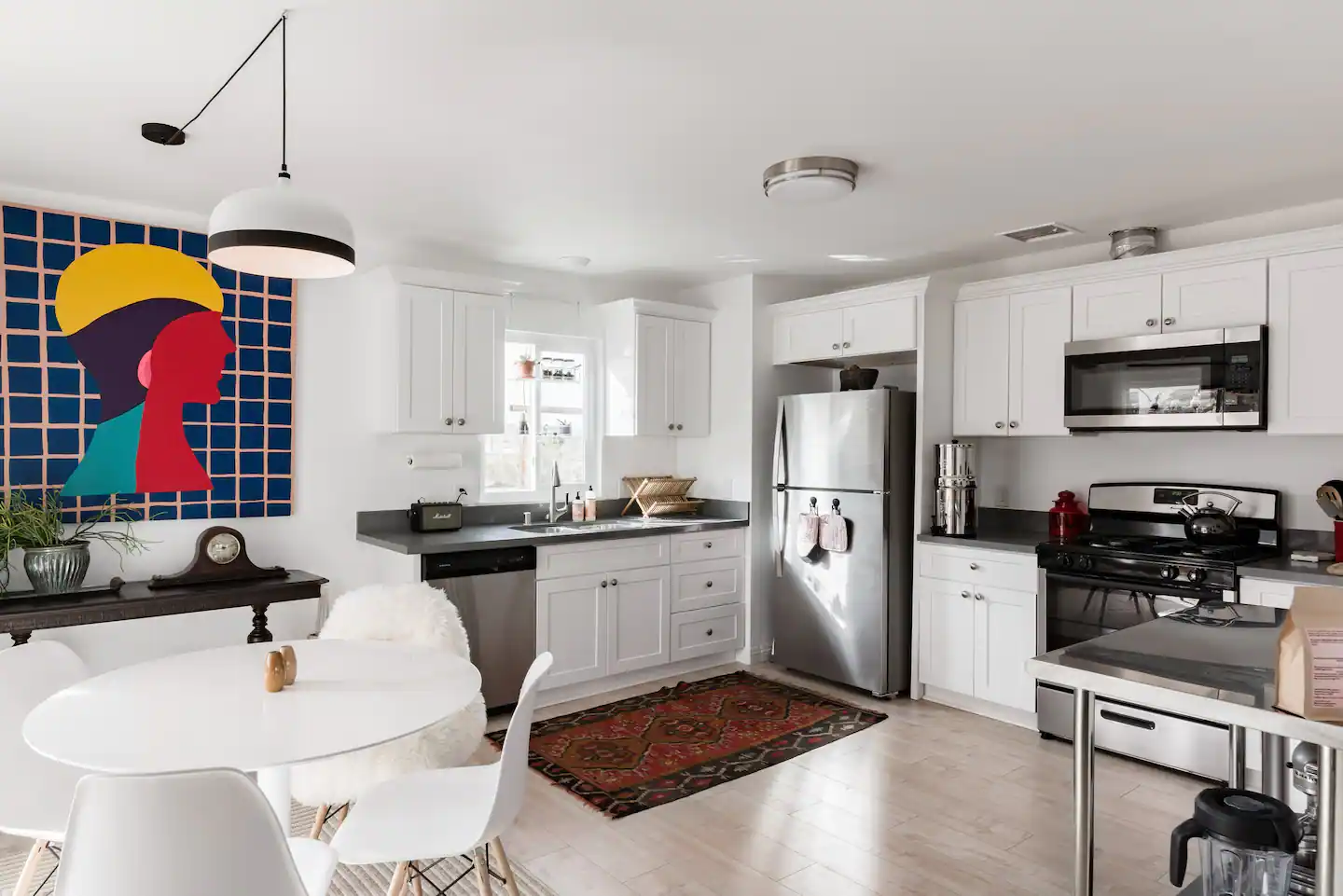 Kitchen with colorful painting